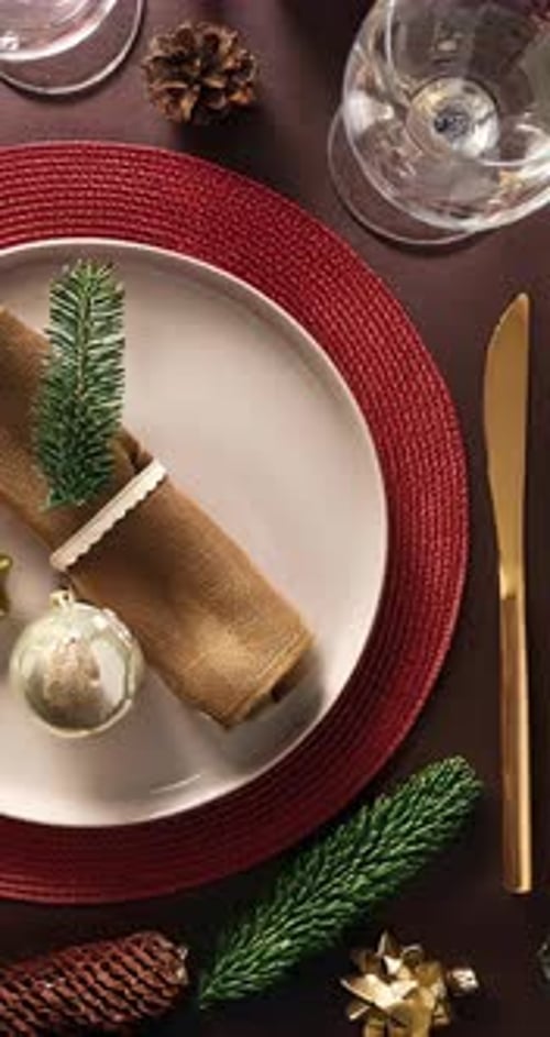 Festive Christmas Table Setting with Gold and Red