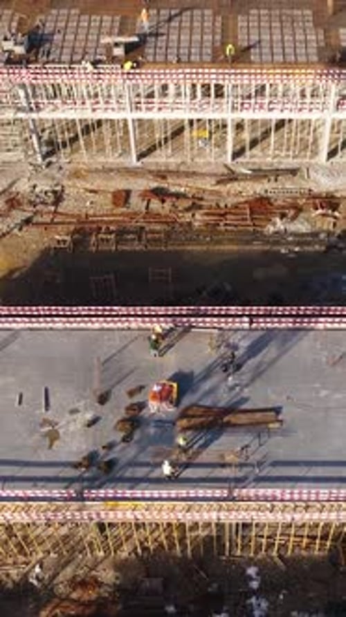 Vertical Video of Construction Workers in the Roof of New Building