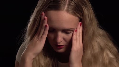 Woman Face Close Up With Hand Gestures of Sadness