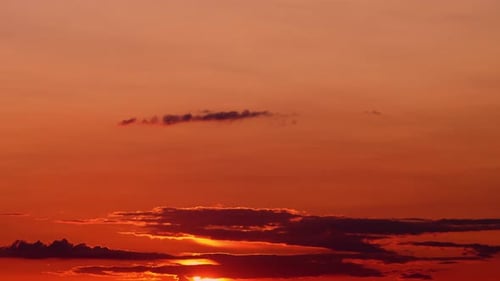 The timelapse of the sunset captures the ever-changing beauty of the evening sky.