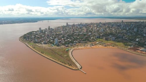 Bird's-eye view of the city of Posadas, gracefully nestled along the curves of the mighty Paraná riv