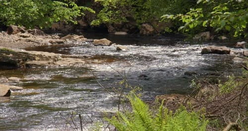 mid shot looking down the river swale, at keld, Swaledale