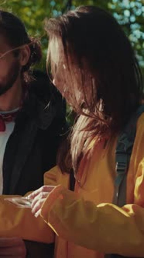 Young Tourists Hiking in the Woods Navigating Their Route Via Road Map and Compass Extreme