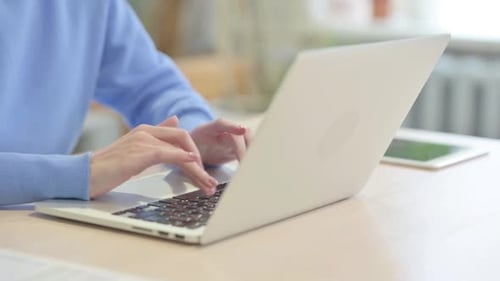 Close up of Woman Typing on Laptop