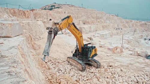 Excavator in Stone Quarry