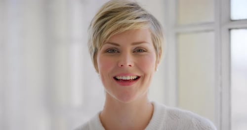 Smiling Woman Portrait in White Sweater