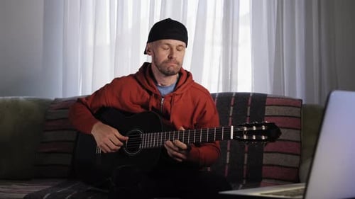 Emotional Guitar Teacher Takes a Rather Unusual Approach to His Online Lessons