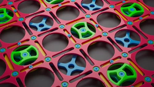 Looping animation of a group of colorful children plastic geometric shapes.