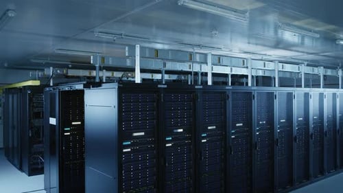 Descending Shot of Modern Data Center With Multiple Rows of Operational Server Racks. Modern High-T