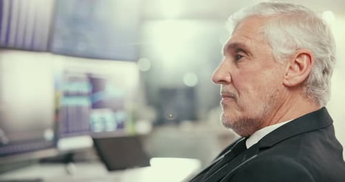 Tired, mature businessman and trader with stock market for exchange, trading