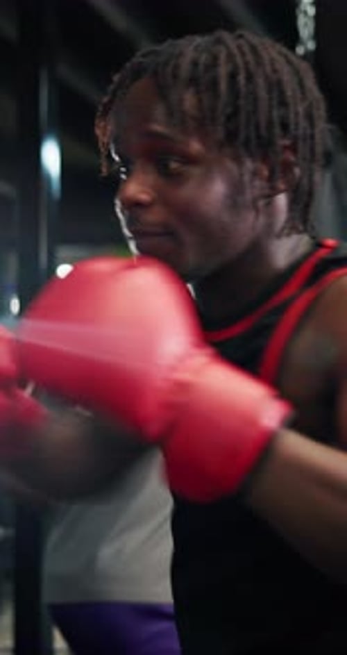 Boxing, fitness and black man in gym for sports, workout or challenge with power