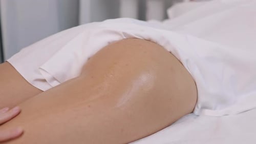 Close Up of Leg Massage with Oil