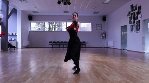 Woman Dancing Gracefully in Dance Studio