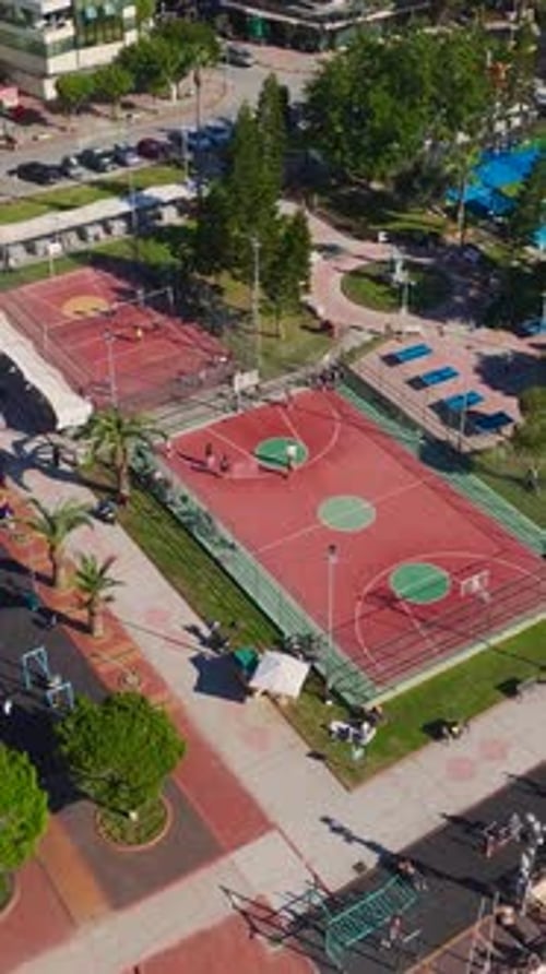 Vertical Video Basketball Court With Clear Markings and Open Surroundings Captured From Above on a