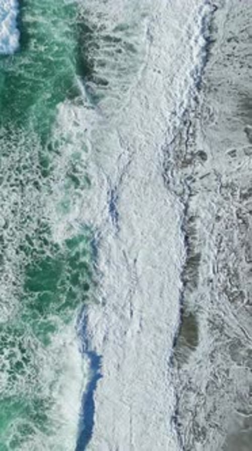 Vertical Video Powerful Azure Storm Over the Ocean With Dramatic Waves and Moody Sky