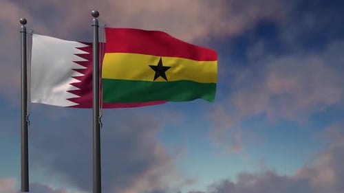 Waving Flags of Qatar and Ghana Against Cloudy Sky