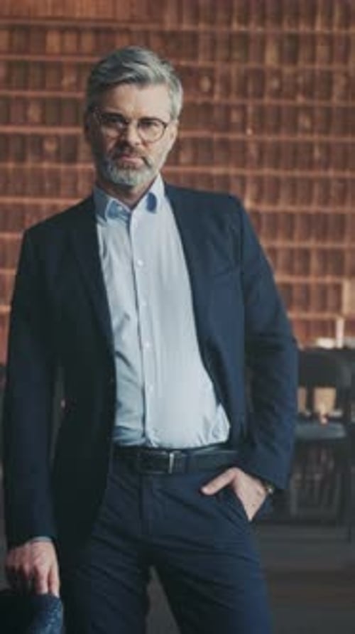 Professional Executive Portrait Senior Professional Confidently Posing in Formal Office Environment