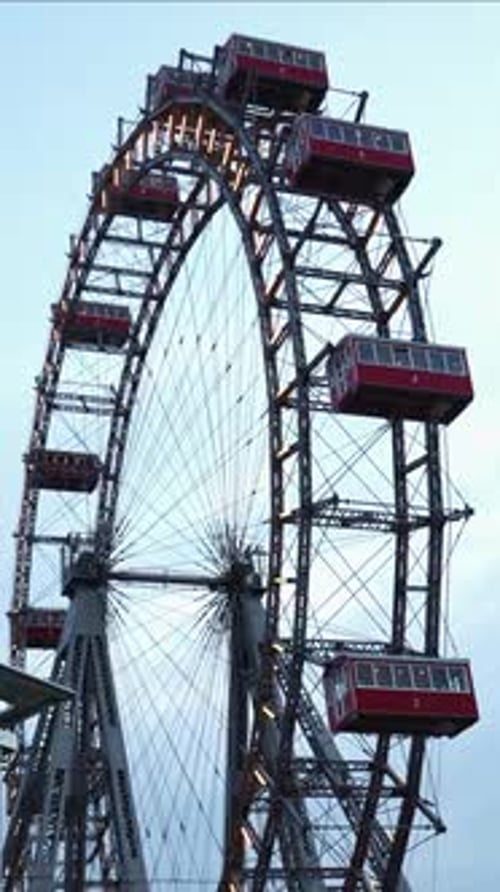 vertical Giant Ferris Wheel Rotating in Vienna Prater Amusement Park