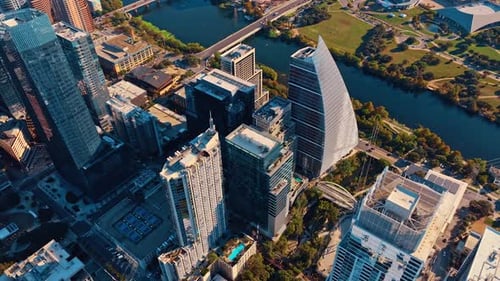 Rising over the tops of high-rises in modern Austin downtown, Texas, USA.