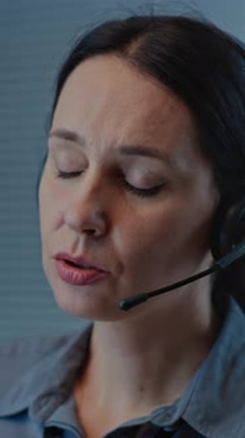 Woman Wearing Headset in an Office Workplace
