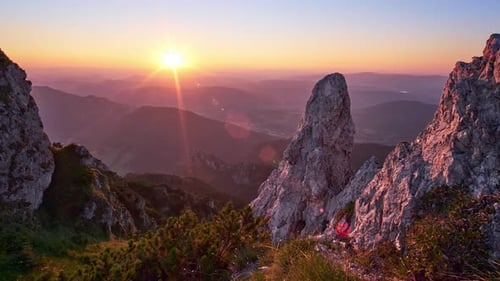 Mountain Panorama at Sunset in the Summer Clear Sky Sharp Rocks in Te Rays of the Sun