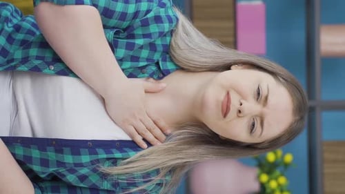 Vertical video of Woman experiencing pain in bones.