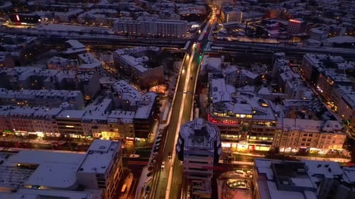 Berlin Steglitz shopping street in Snow at winter evening. Unbelievable aerial viewdrone