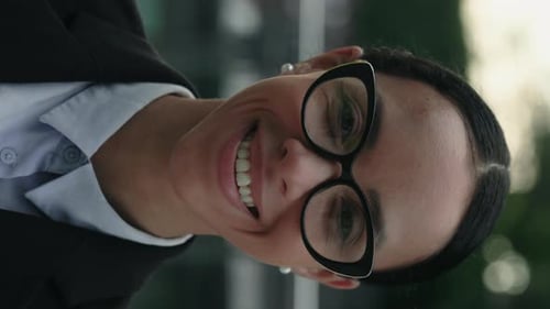 Smiling Business Woman with Stylish Glasses Outside