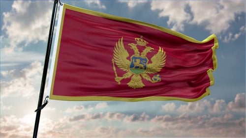 Realistic Montenegro Flag Waving in Blue Sky