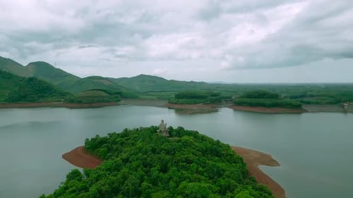 Aerial View From Top of the Mountains with Lake and Tropical Rainforest in Vietnam