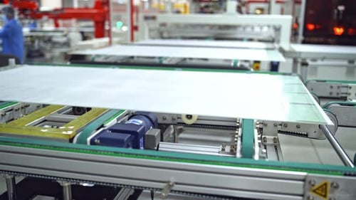 Working factory mechanism of making solar panels.