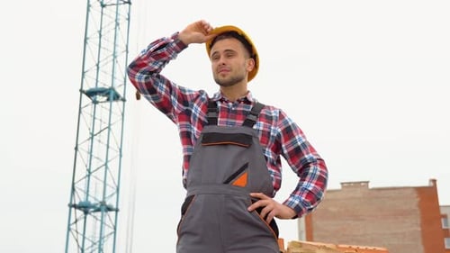 View of an Attractive Worker on a Construction Site