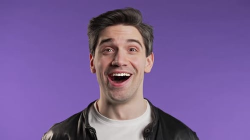 Excited Young Adult Smiling in Close Up