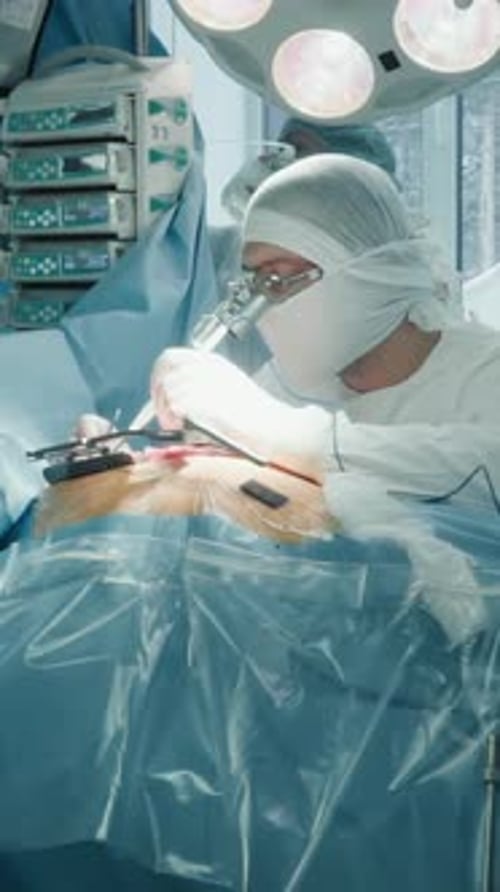 Surgeon Makes Small Cuts with Laser Scalpel