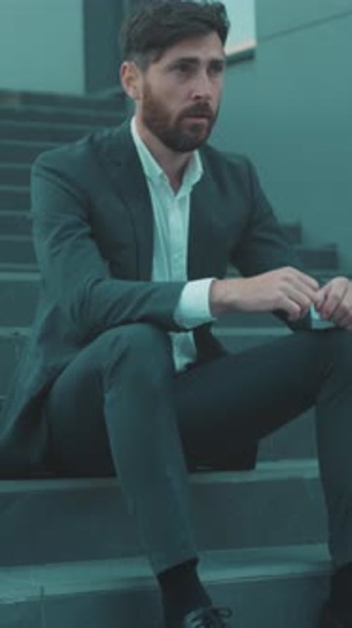 Manager Reflects on Uncertain Future Business Leader Faces Introspective Moment Amid Urban