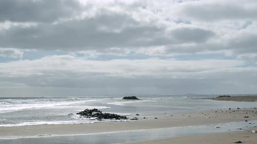 Waves crash on the shore