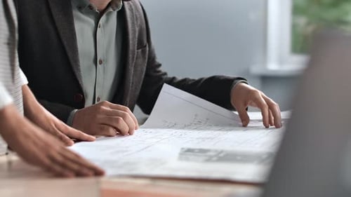 Unrecognizable Engineer Coworkers Plan Blueprint Architect Project Brainstorming Office Desk Closeup