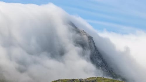 Time lapse of fog flowing over a mountain in Norway