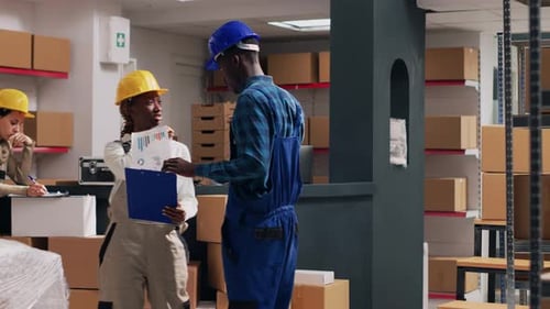 Warehouse Workers Taking Inventory