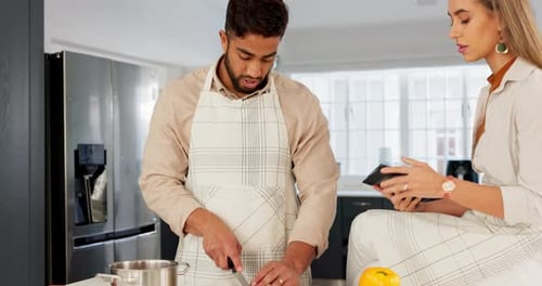 Couple Cooking Together in Modern Kitchen