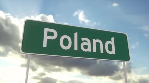 Welcome to Poland road sign on blue sky with clouds