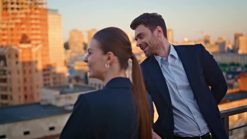 Business Partners Standing Balcony Office Contemplating Sunset City View Closeup