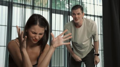Distressed Woman Reacts to Angry Man's Outburst