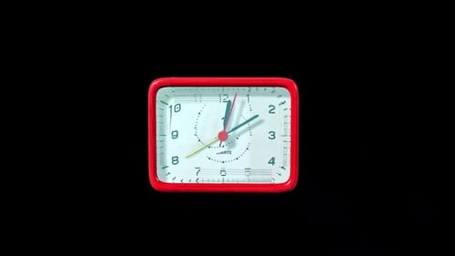 Retro Red Alarm Clock with Rapidly Advancing Time