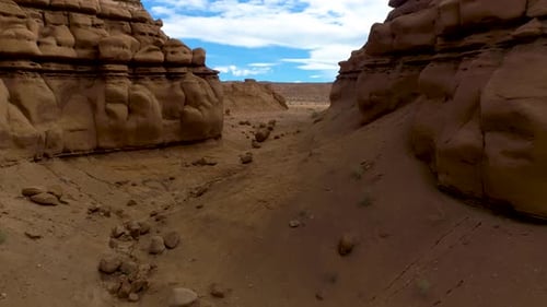 Beautiful aerial footage of canyons full of red rocks in utah