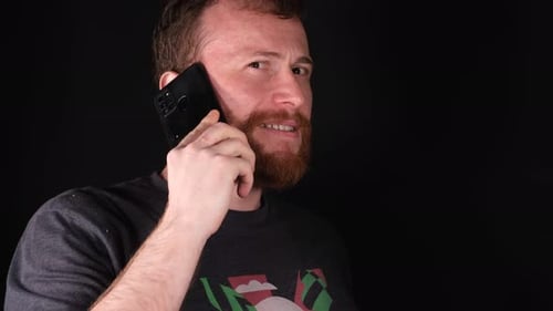 Man Talking on a Cellphone Device