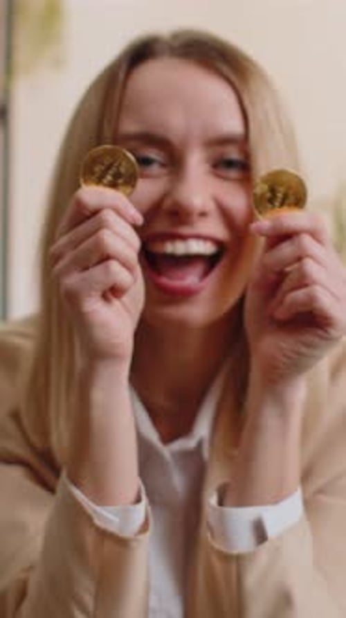 Businesswoman Stock Trader Earning Count Bitcoins Online Monitoring Trading Operations at Office
