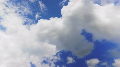 White Clouds Moving in a Blue Sky
