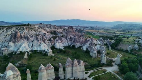 Aerial Drone Shot of Cappadocia's Stunning Rock Formations at Dusk