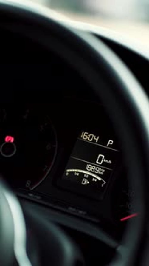 Car Dashboard Showing Zero Speed and Mileage